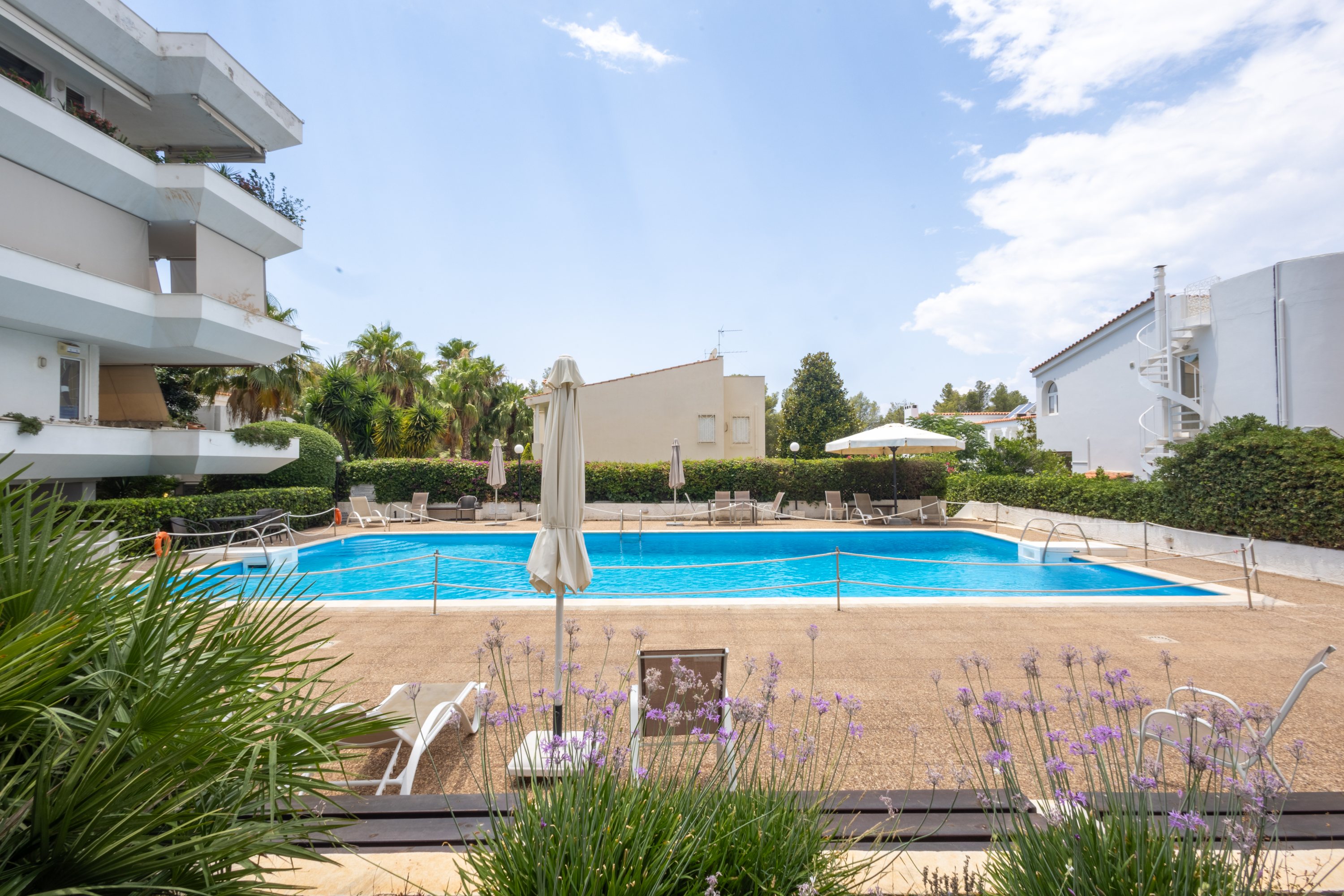 Shared residential swimming pool accessible to the Voula residence